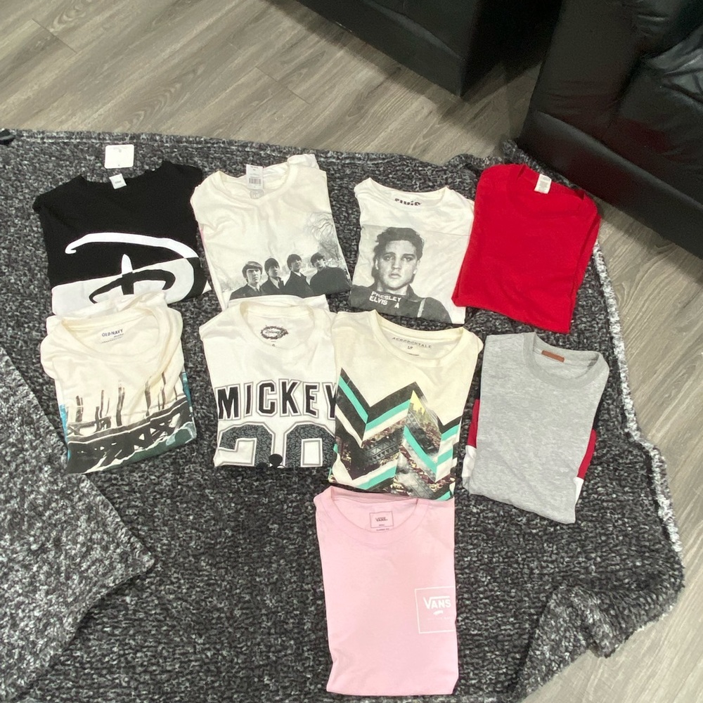 Selling a lot of 9 small size shirts. They all have variable fitting when worn
